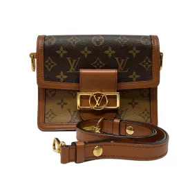 Dauphine Reverse Mini Brown Crossbody Bag in Monogram Coated Canvas, Gold hardware