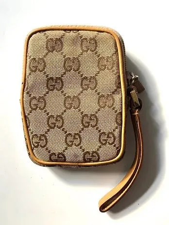 GUCCI MONOGRAM WALLET POUCH