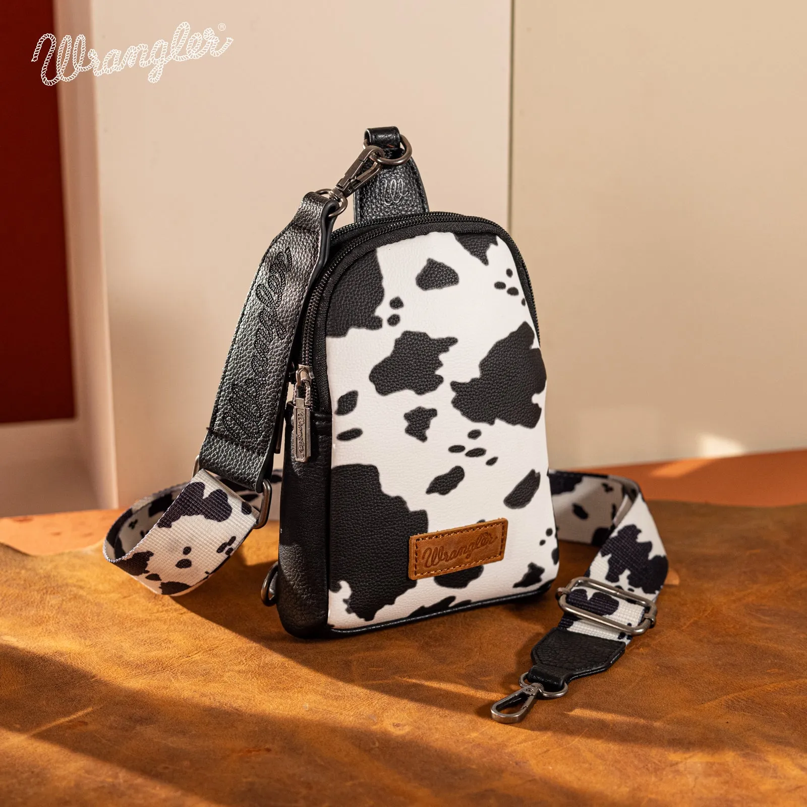 WG133-210  Wrangler Cow  Print Crossbody Sling Chest Bag  - Black